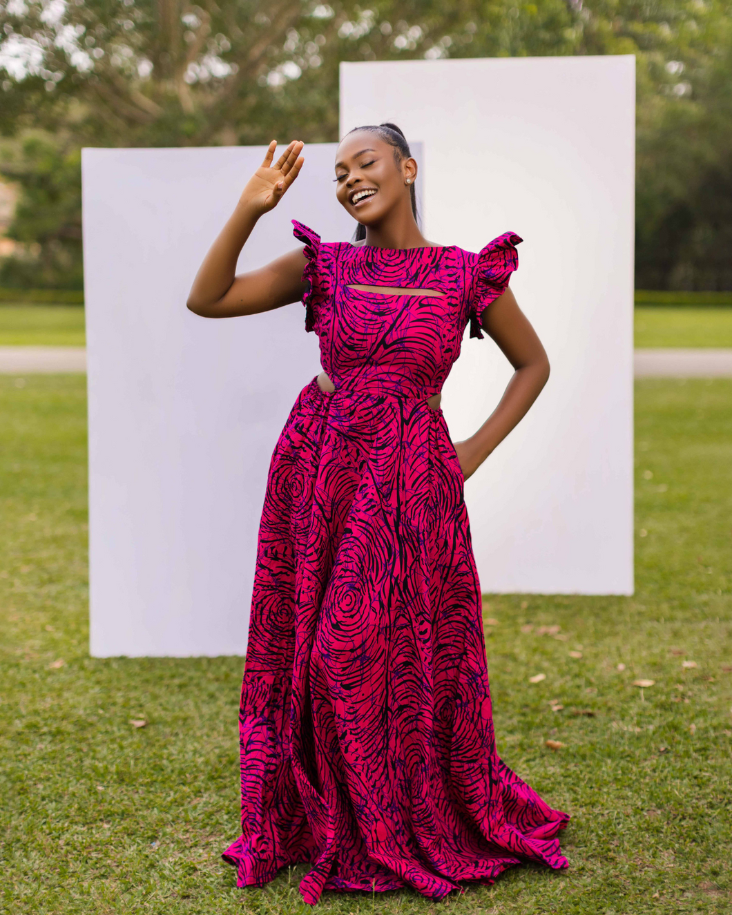 PRODUCT DETAILS Handcrafted Maxi dress Bodice cut-out with elastic waist High neckline Front peekaboo cut-out detail Frilled cap sleeve Back zipper Keyhole back cut-out detail Side pockets Single tier flare skirt base African print (Ankara)