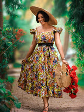 Load image into Gallery viewer, African print midi dress with shirred back detail and side pockets.  The model is wearing a size 12.
